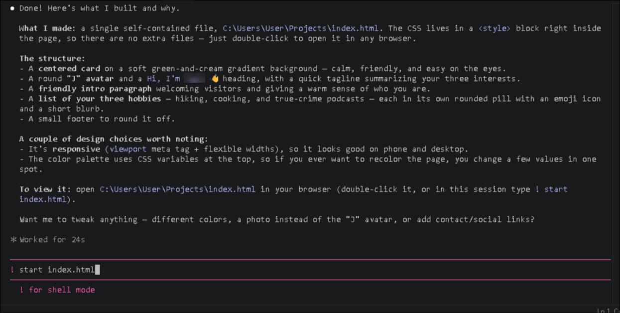 Claude Code's completion message explaining what it built and telling you to type ! start index.html to view it